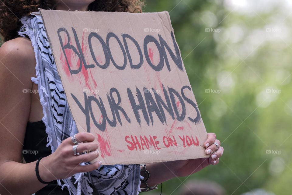 Billboard Blood On Your Hands At The Student Demonstration Free Palestinian At The UVA University Amsterdam The Netherlands 13-5-2024