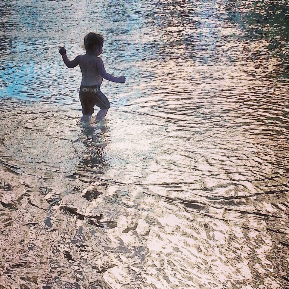 rivertime. playing at the river on a summer day