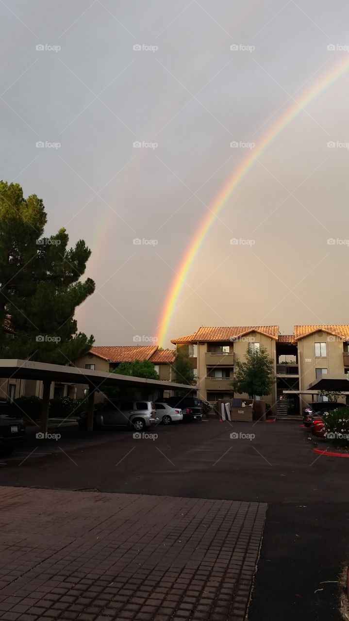 double rainbow. a vibrant double rainbow taken in tempe arizona.