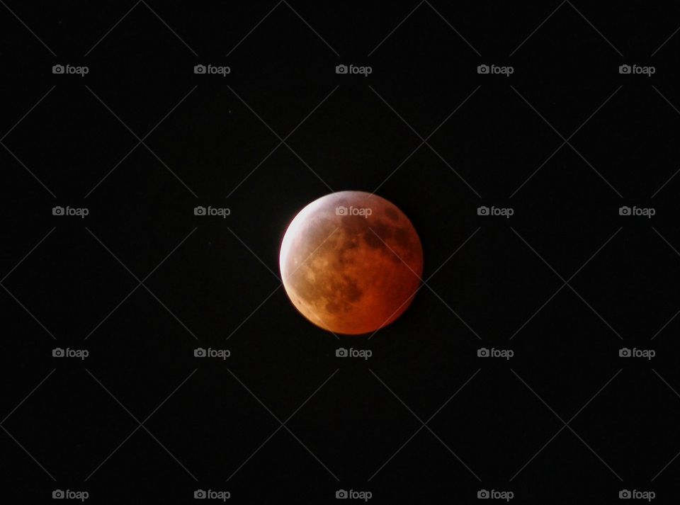 full moon lunar eclipse red space