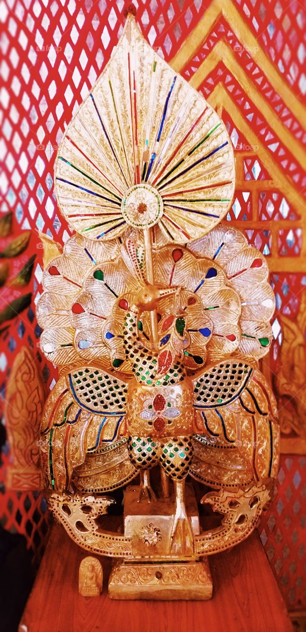 talipot fan, a palmleaf fan used by a Buddhistpriest when chanting prayers before an audience.