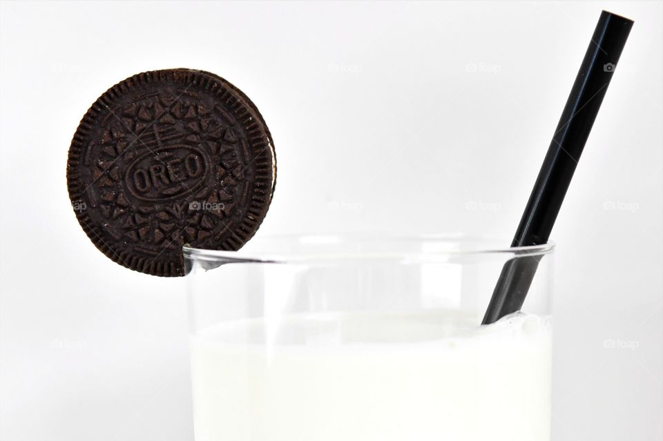 Glass of milk with Oreo cookies