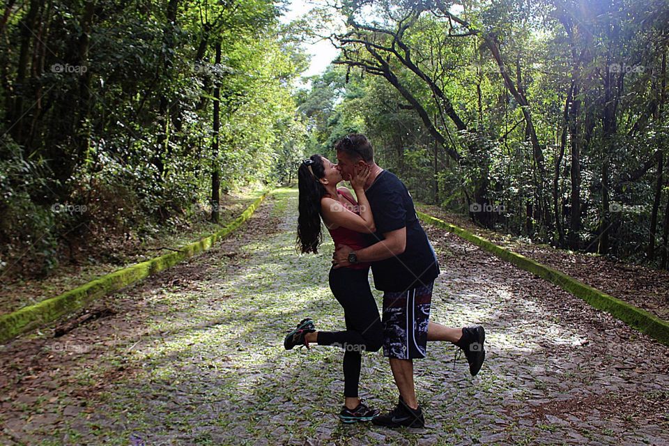 Couple approaching for a romantic kiss.