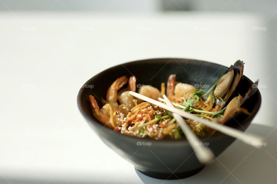 close-up of a plate with Asian cuisine