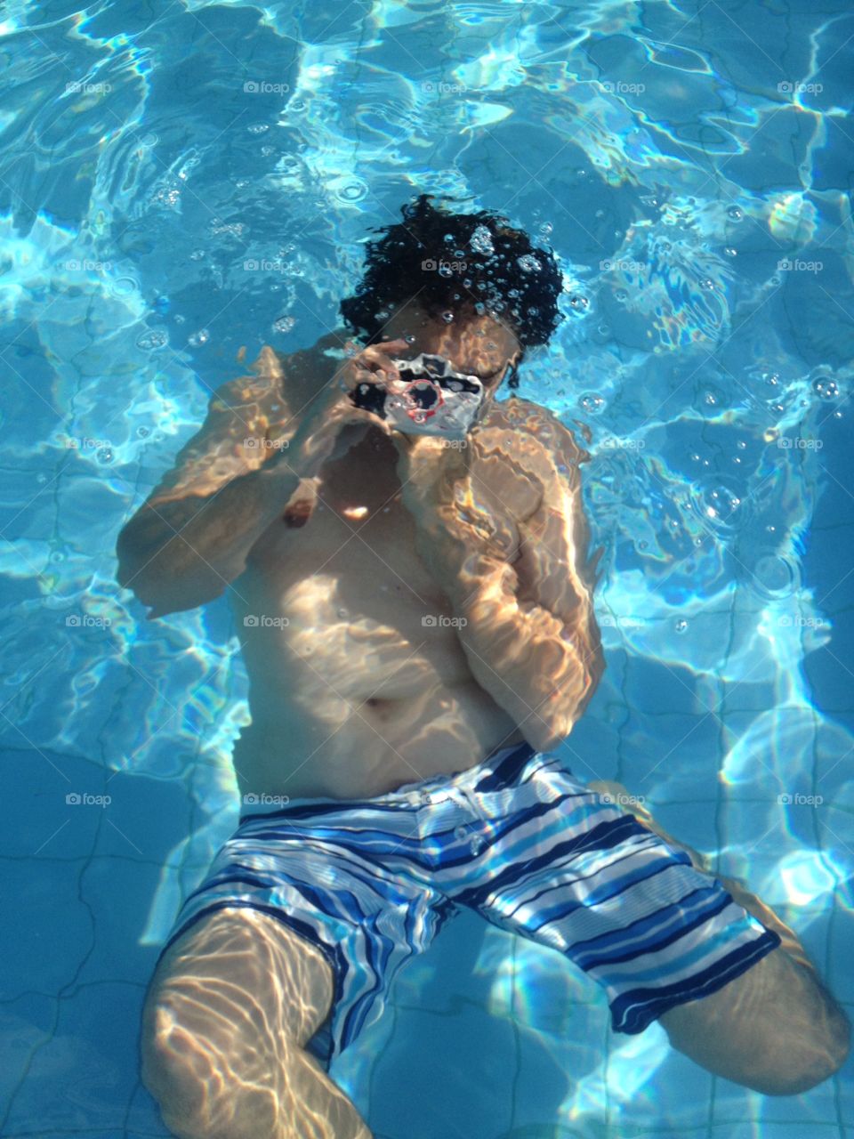 Aquatic pictures . Submerged Photographer!