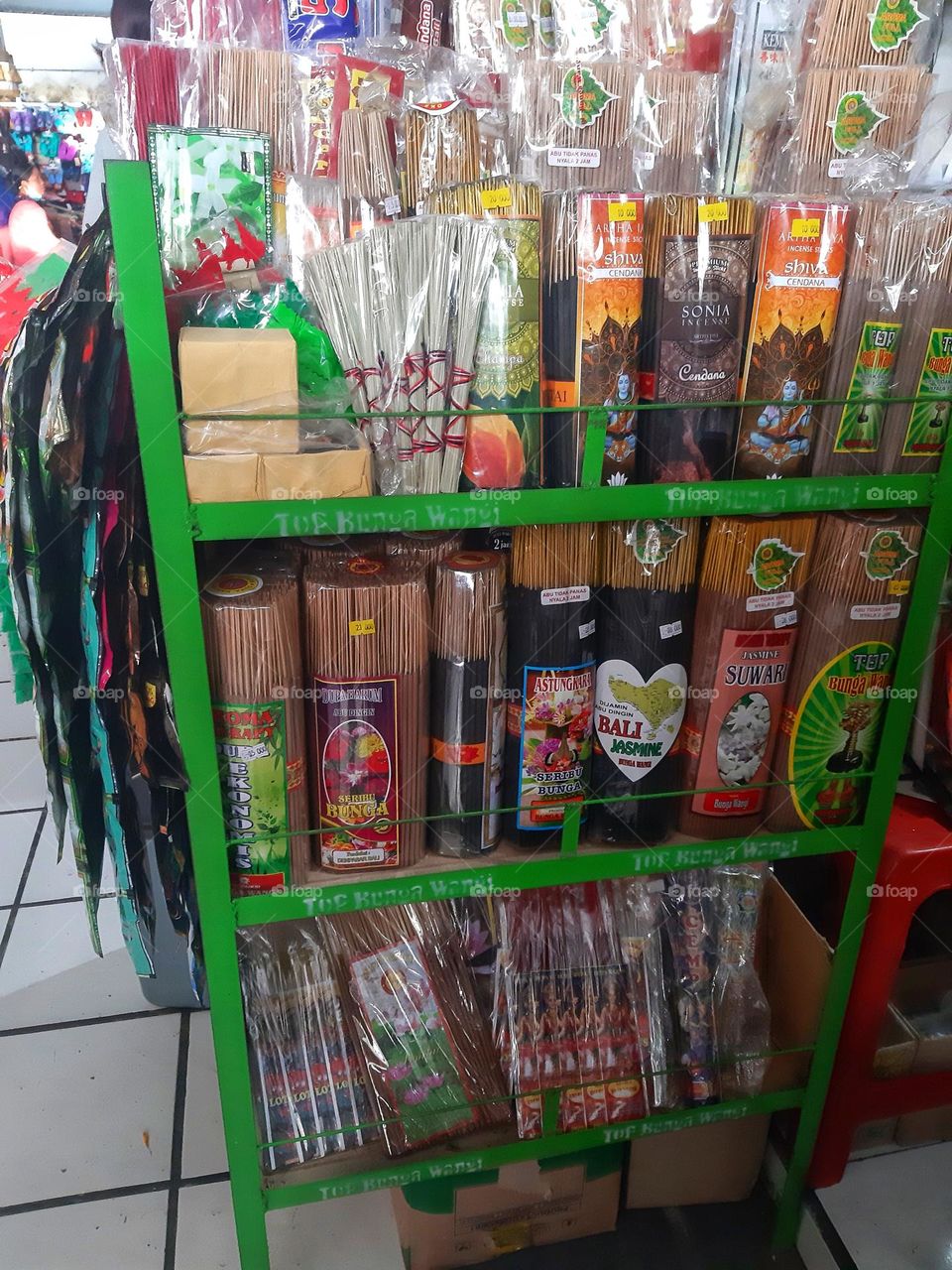 Many local balinese lightsticks placed on the shelf
