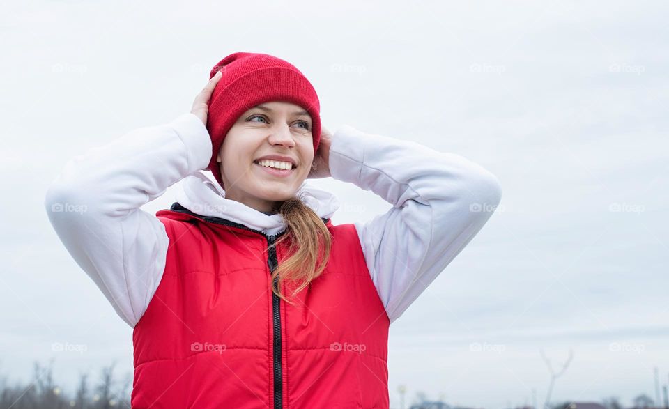 woman in red hat and sweater