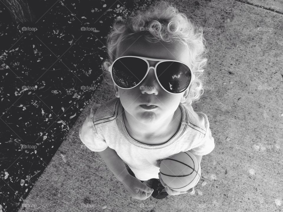 Little Boy Playing Basketball in Sunglasses