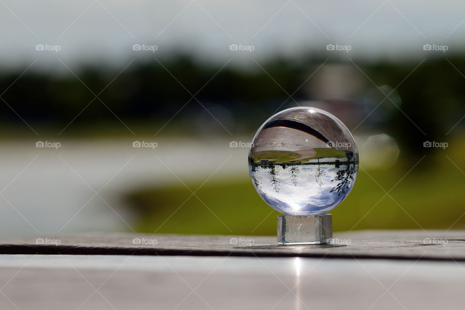 Lakeside Pathway Perspective. Sitting at the bench lakeside with a quartz sphere.