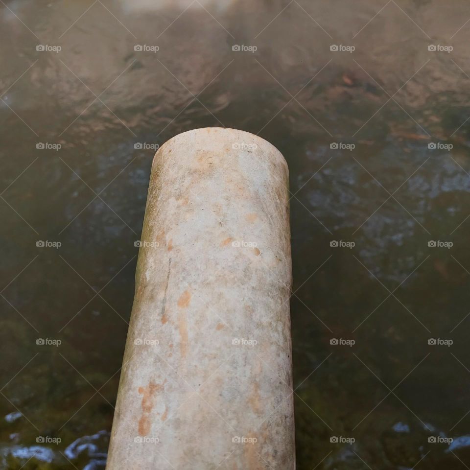 drain pipe to the river