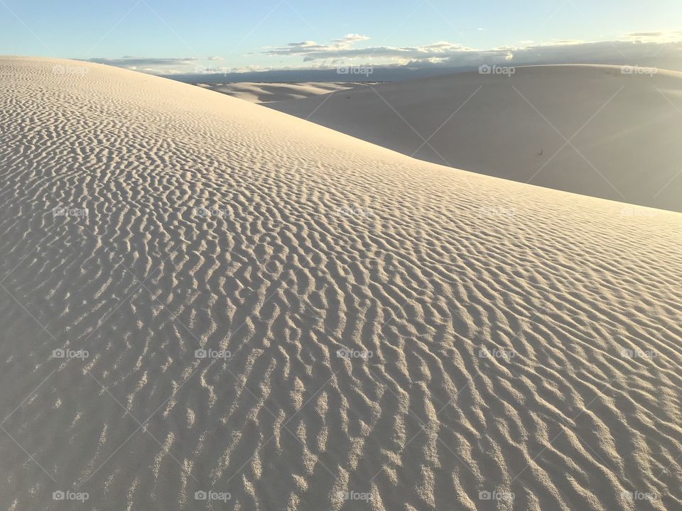 Morning sunshine and shadows on wind sand dunes in the Chihuahua desert of New Mexico