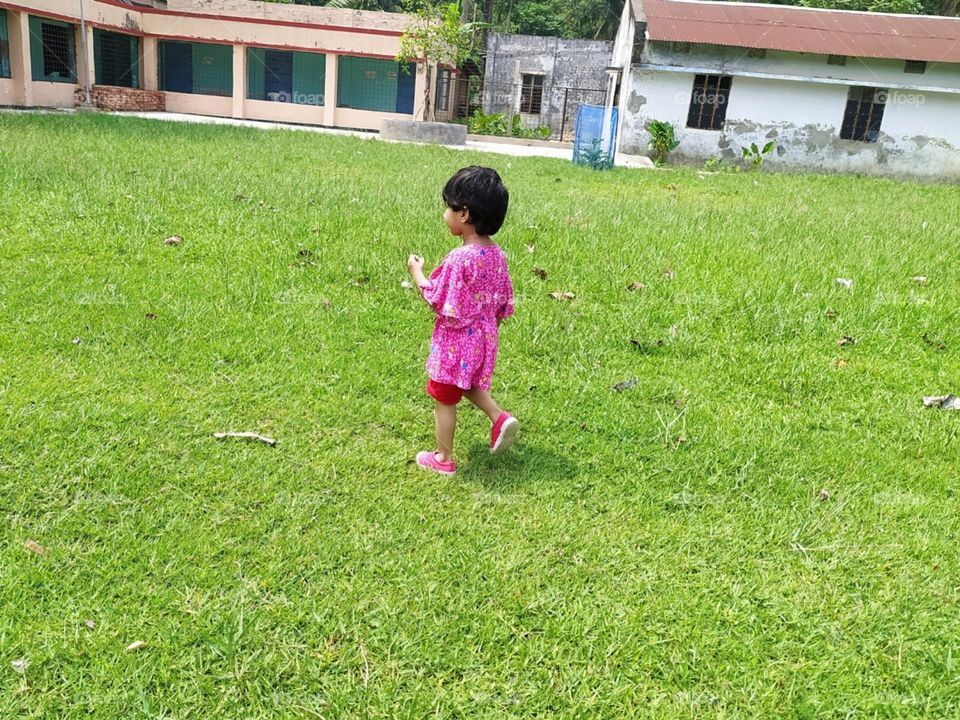 Green grass walking baby