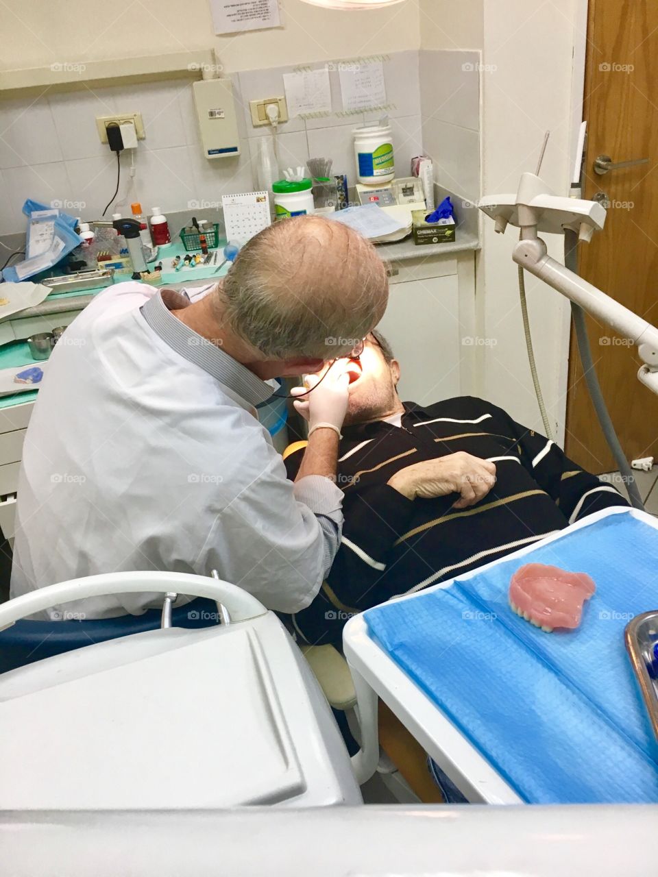 Dentist in treatment