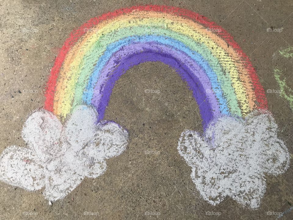 Playing with sidewalk chalk 