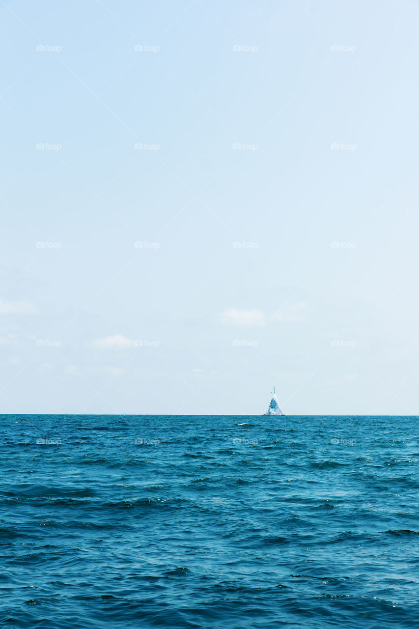 Ship in blue sea