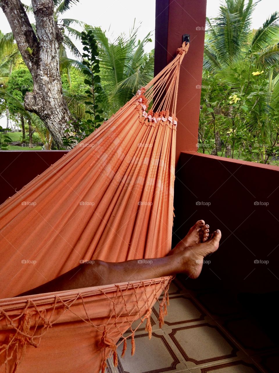 relaxing lying in a hammock