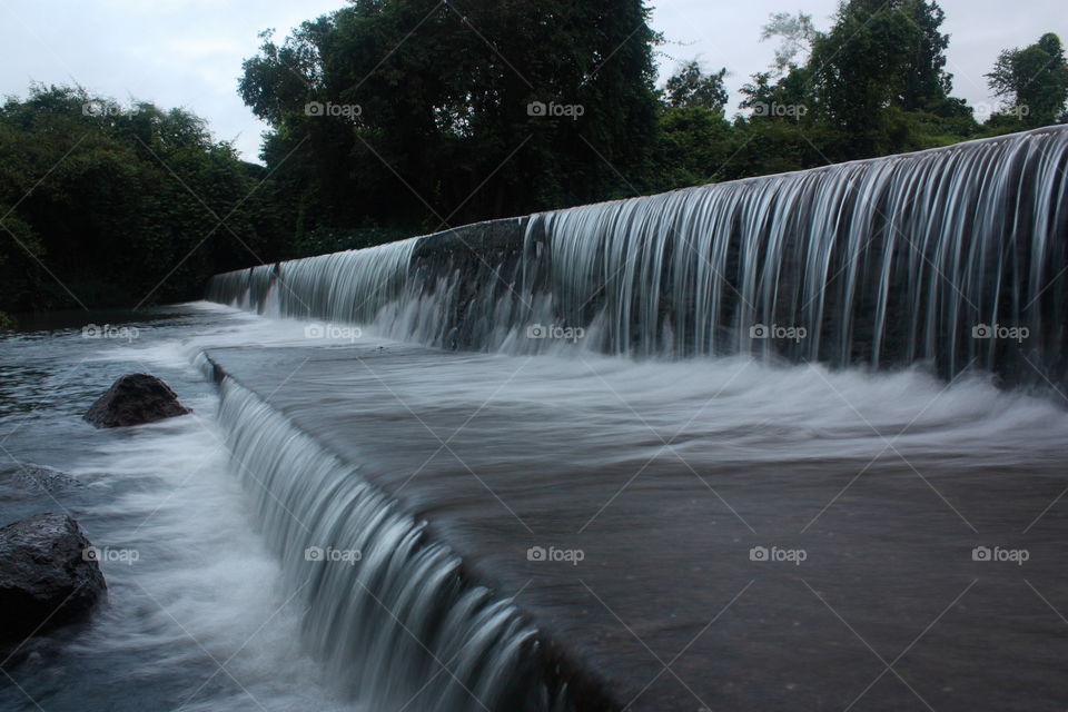 water flowing over the steps