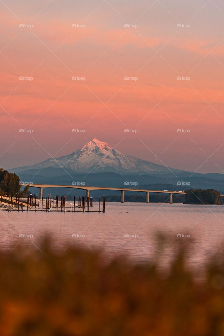 Sunset over mountain and river with copy space 