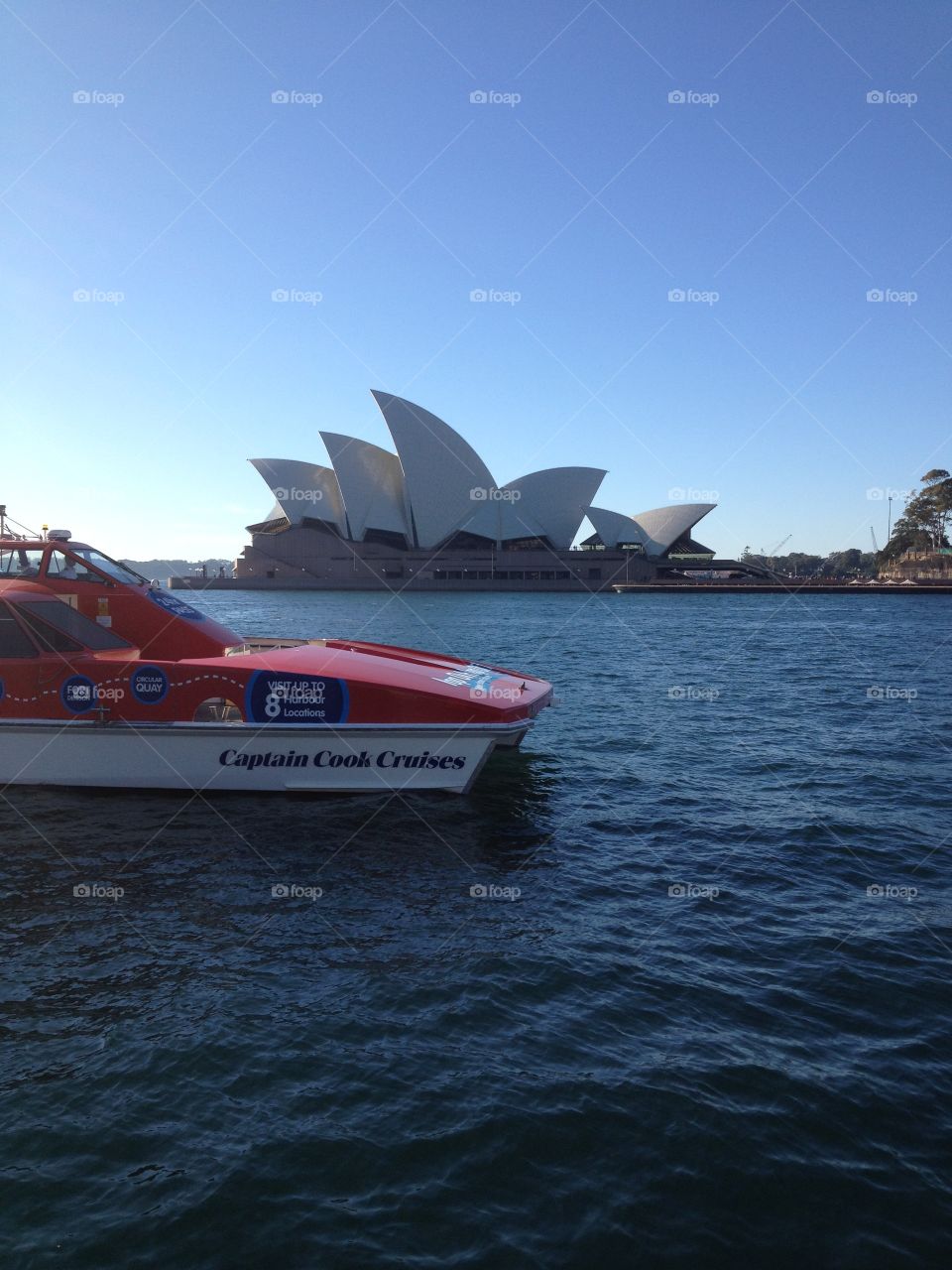 Sydney harbour with Opera House and ferry boat