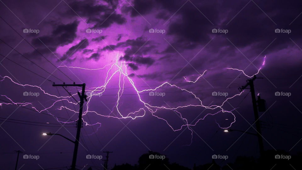 Storm chasing chaser stormy bad weather rain rainy gloomy purple color colorful thunderstorm thunder Lightning mother nature