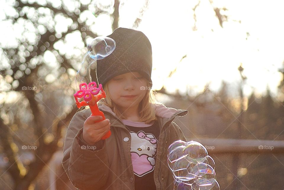 Girl blow bubbles