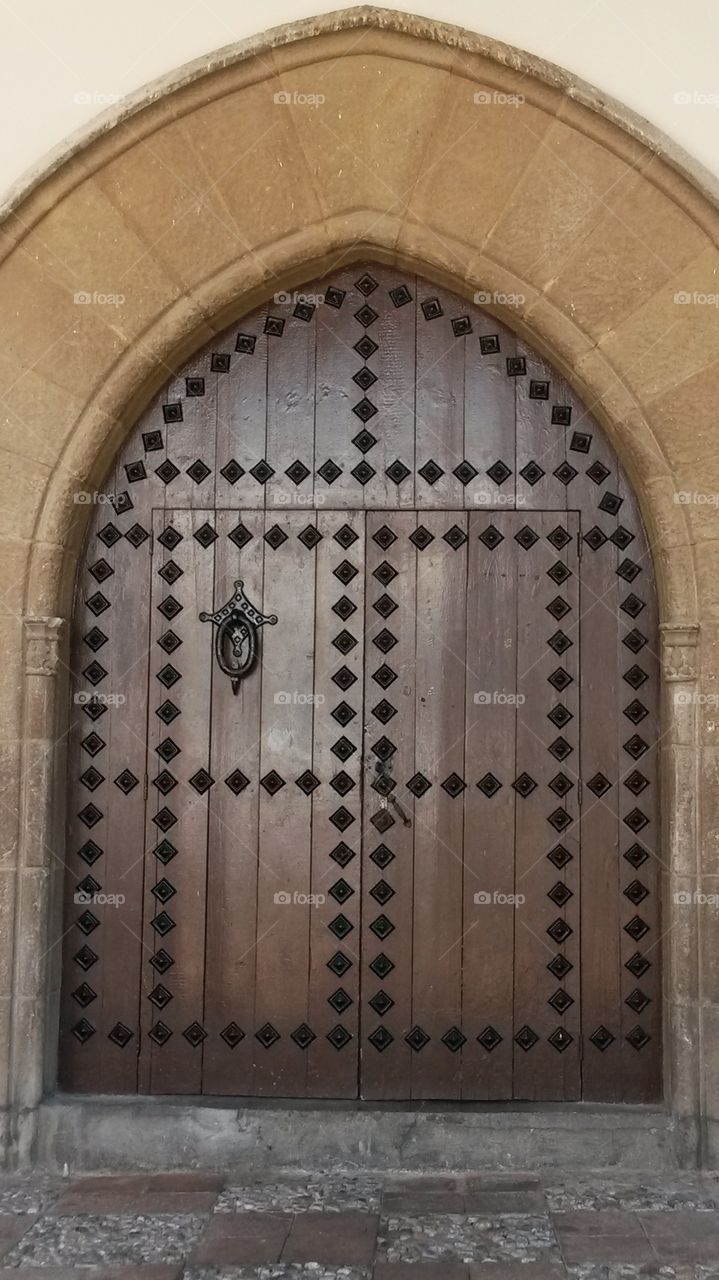 Big brown door in Barcelona, Spain