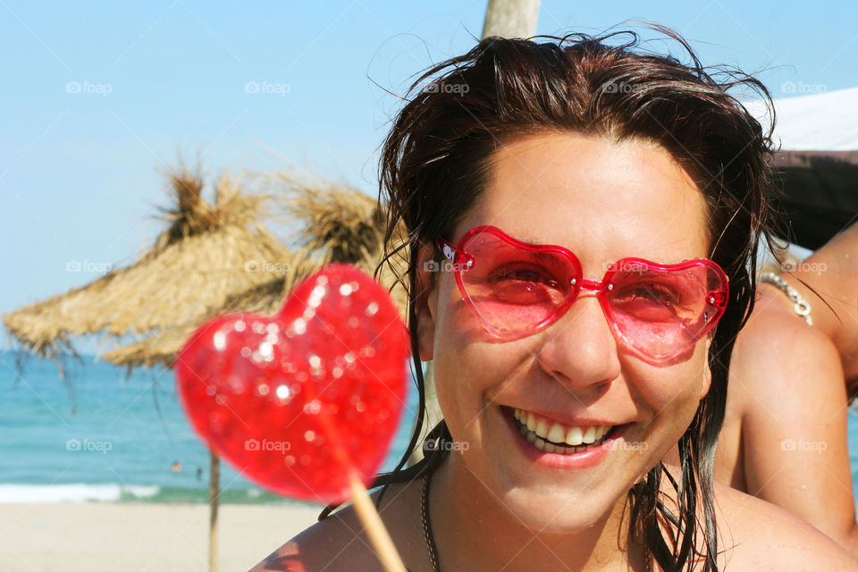 Summer love, a woman on the beach