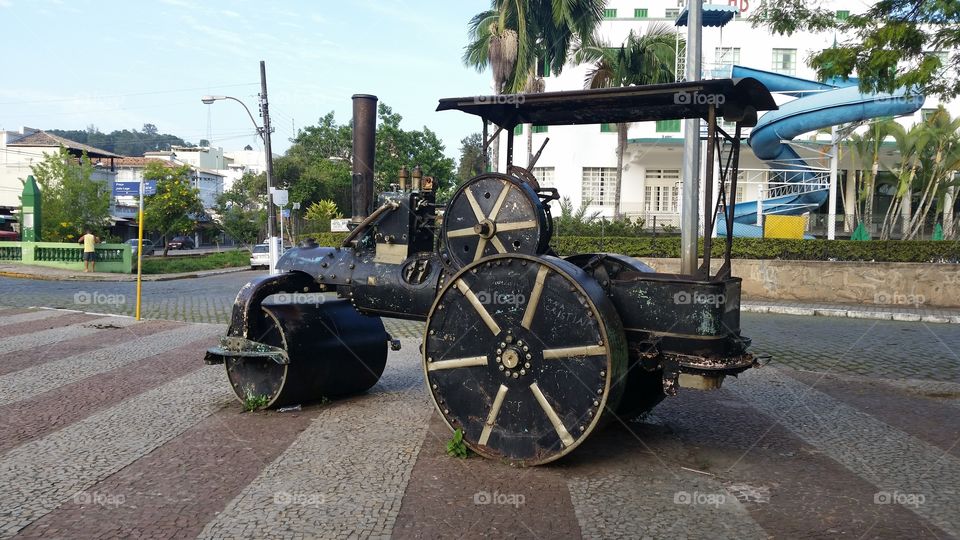 Antique steam roller on pavement