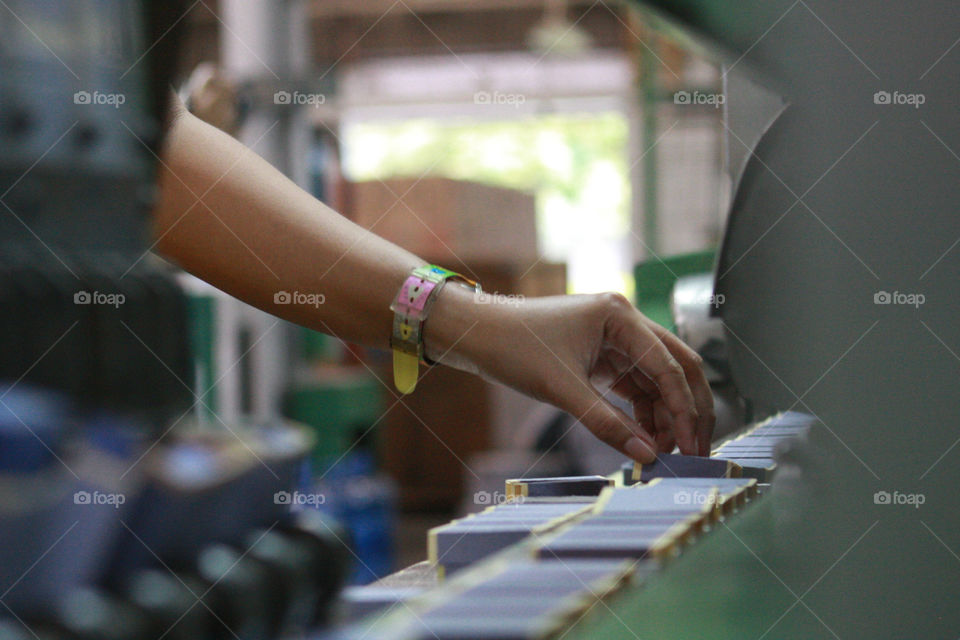 Worker arranging boxes