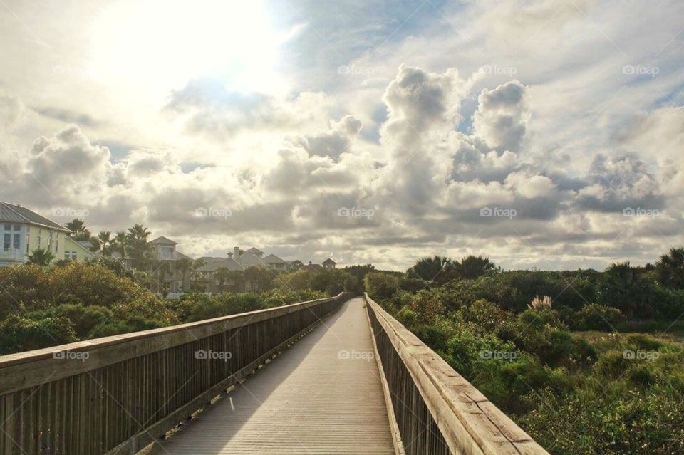 Fade away. A wooden walk way fading away