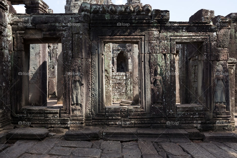 Window inside Ta Prohm temple in Siem reap Cambodia 
