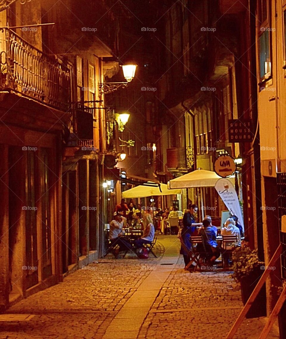 People sitting in café at night