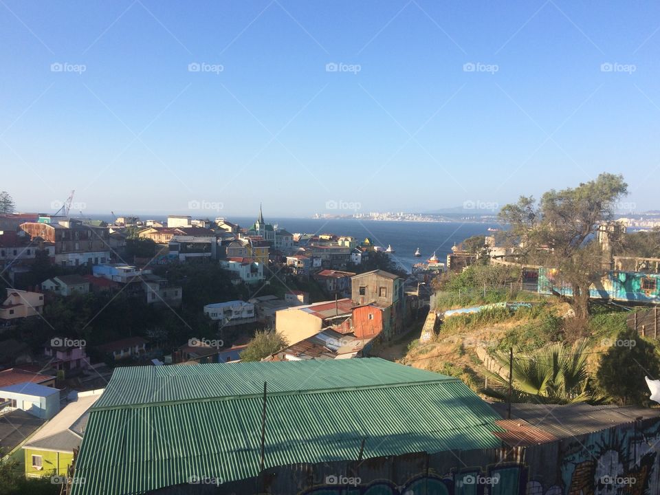Aerial view of sea in Valparaiso Chile with colorful houses in a beautiful landscape 