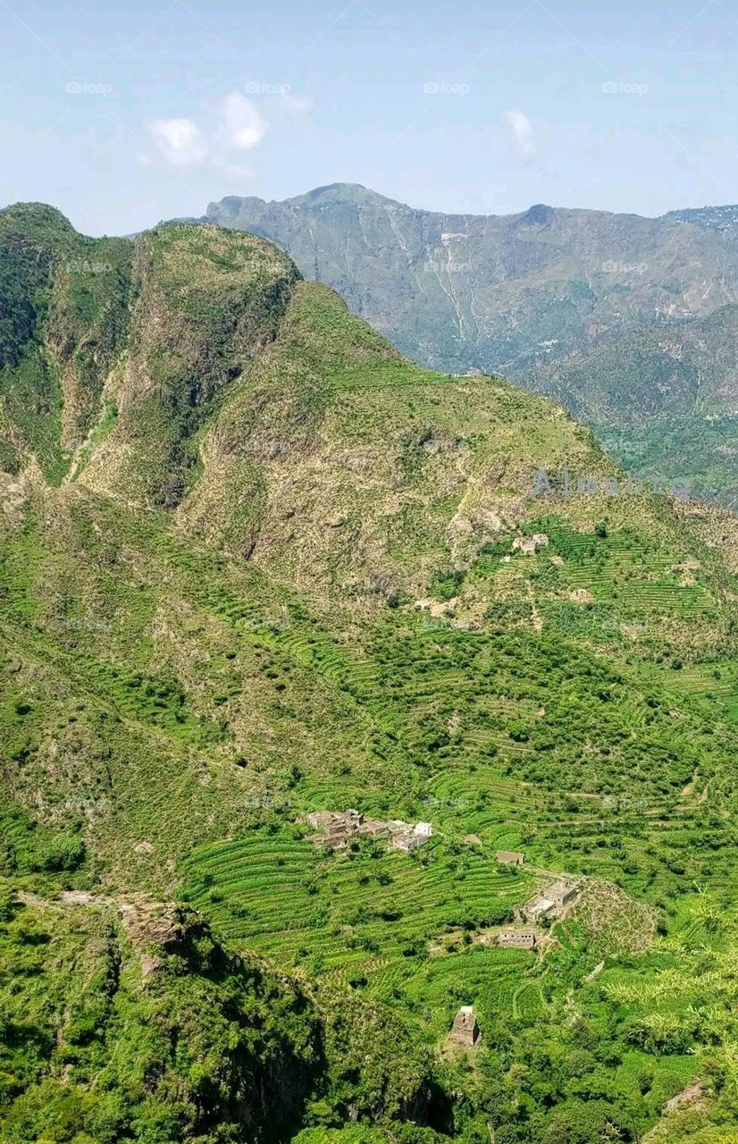 Glory be to God, the magnificent and picturesque view and the natural green trees are a view that is nothing more wonderful than it