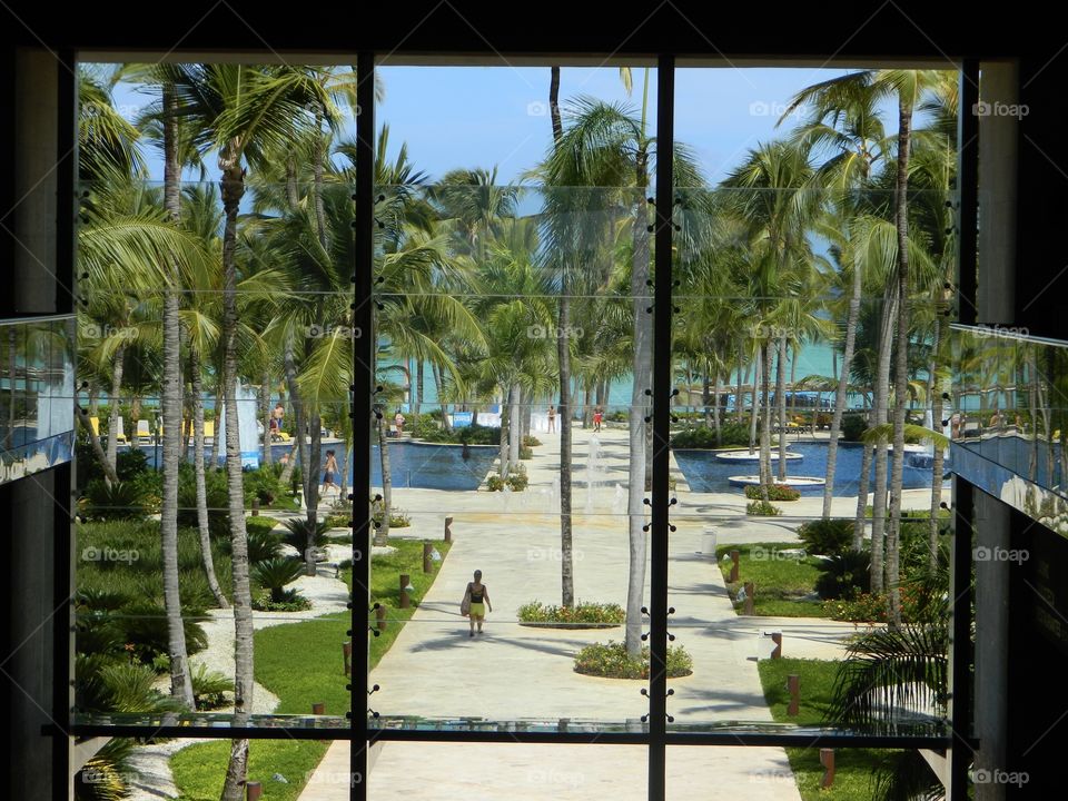 View from window to the pools and the Atlantic Ocean in the Dominican 