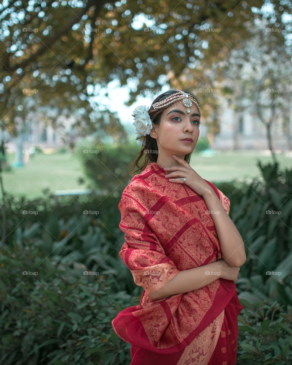 A girl in a red saree