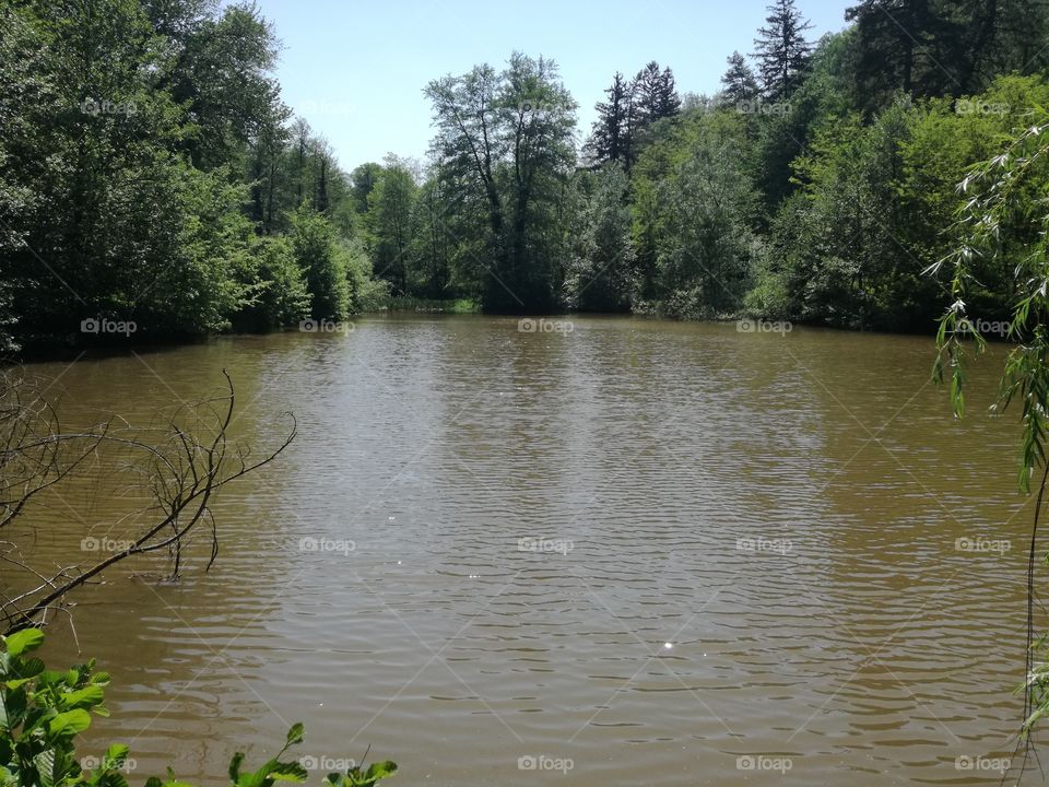 Muddy lake on the top of the mountain