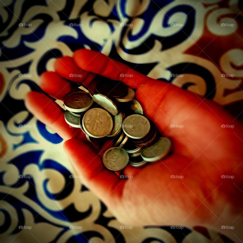 My hand fill with Coins