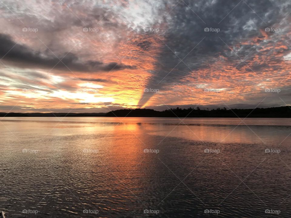 sunset on the Serinhaem river in Marau, Bahia, Brazil