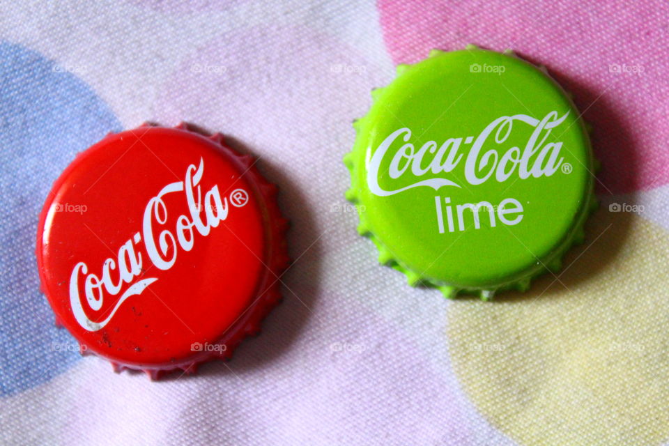Coca cola caps green and red