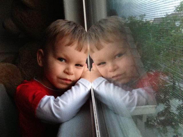 Boy waiting on mom 