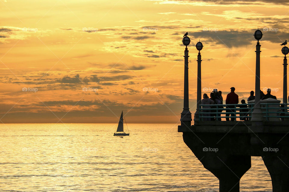 Sailboat ⛵️ sailing during the Golden Hour.