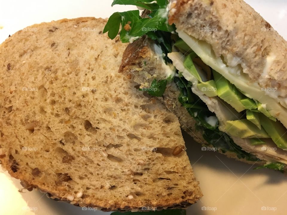 Chicken avocado parsley sandwich