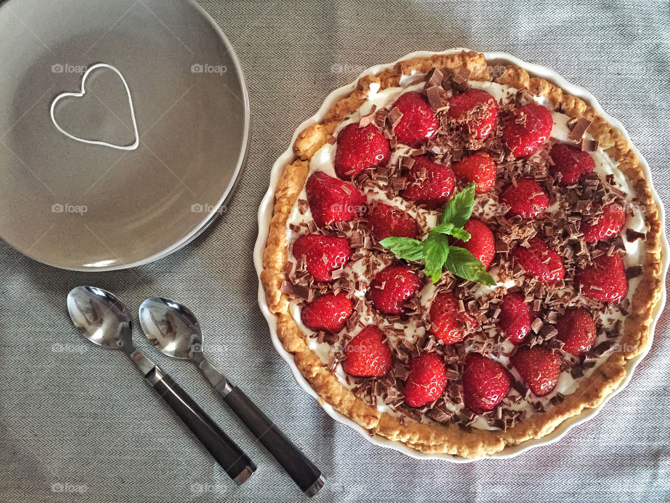 High angle view of strawberries cake