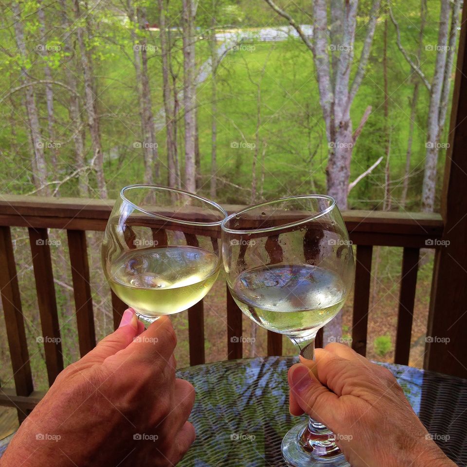 Toasting with glasses of wine 