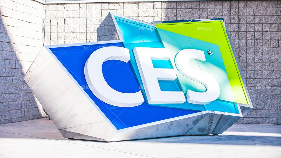 Las Vegas, NV 1-6-2023: Large logo of CES outside the entrance of LV Convention Center. Held annually, CES is the largest consumer electronics convention in the world. Vibrant cool colors on the sign.