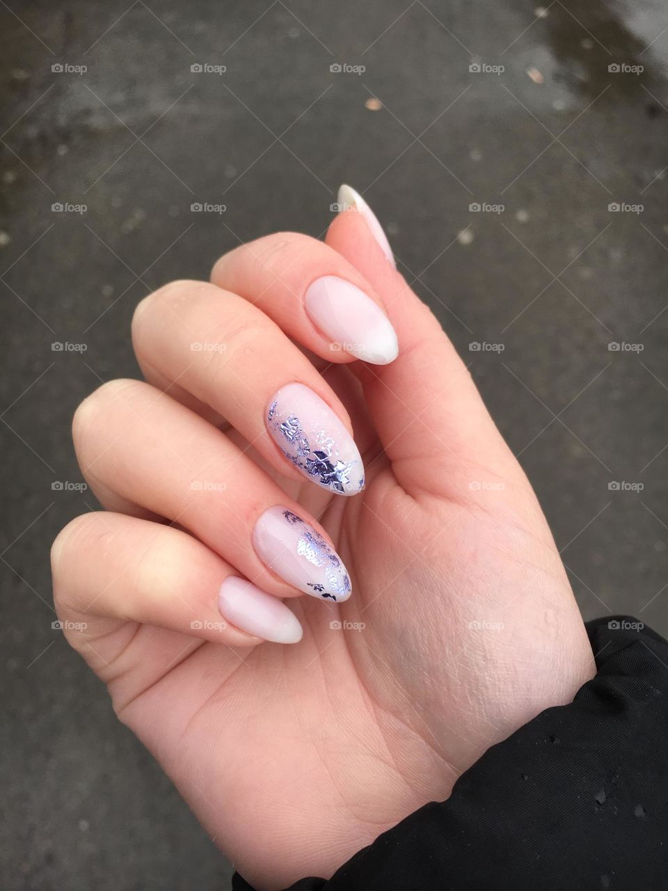 Painted nails, gel polish on nails, women's beautiful and neat manicure