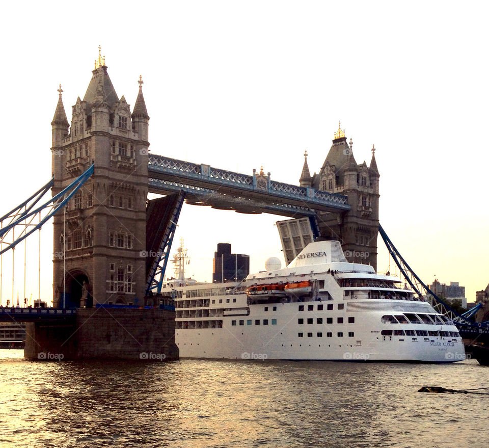 Cruise ship passing through Tower Bridge in London