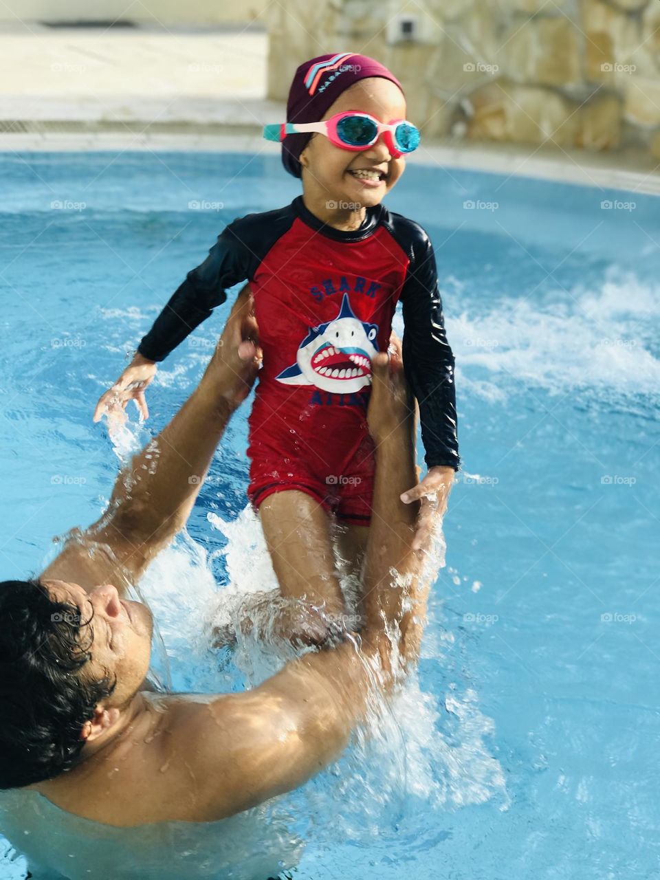 Father and daughter had a great fun at swimming pool 😍