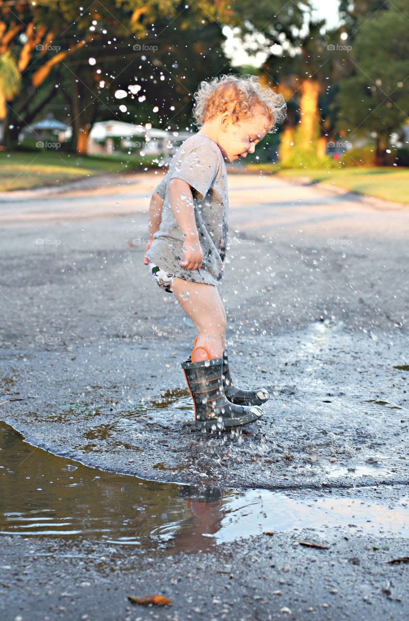 Boy playing in water